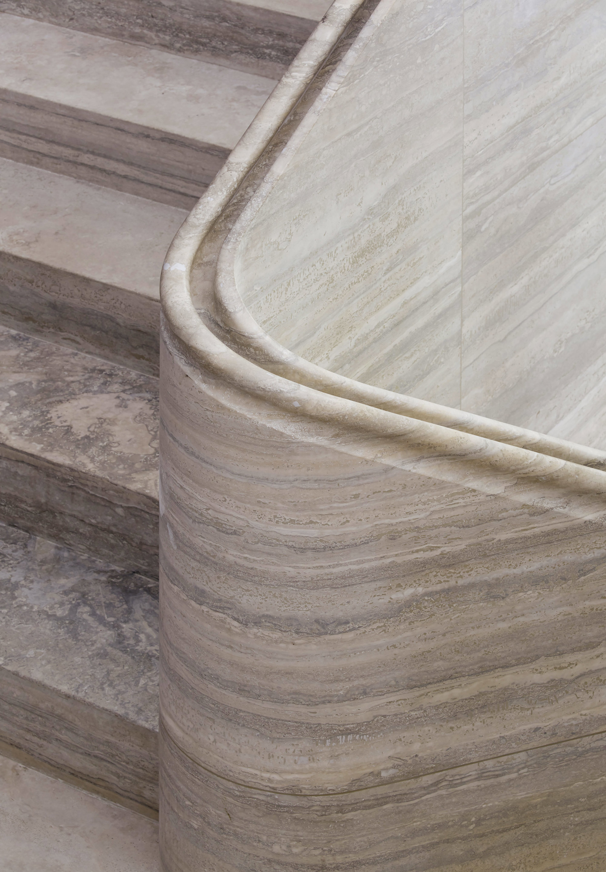 labuena Jamie Fobert Architects Travertine stair central London duplex luxury apartment handrail detail