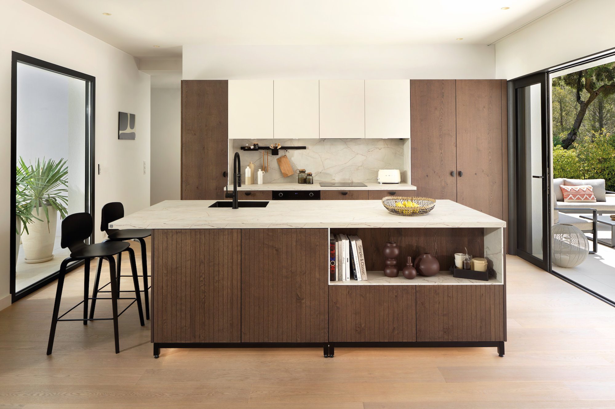La cocina cada vez está más integrada al salón y conectada al resto de la casa, como en este modelo, el Zen, de Schmidt. 