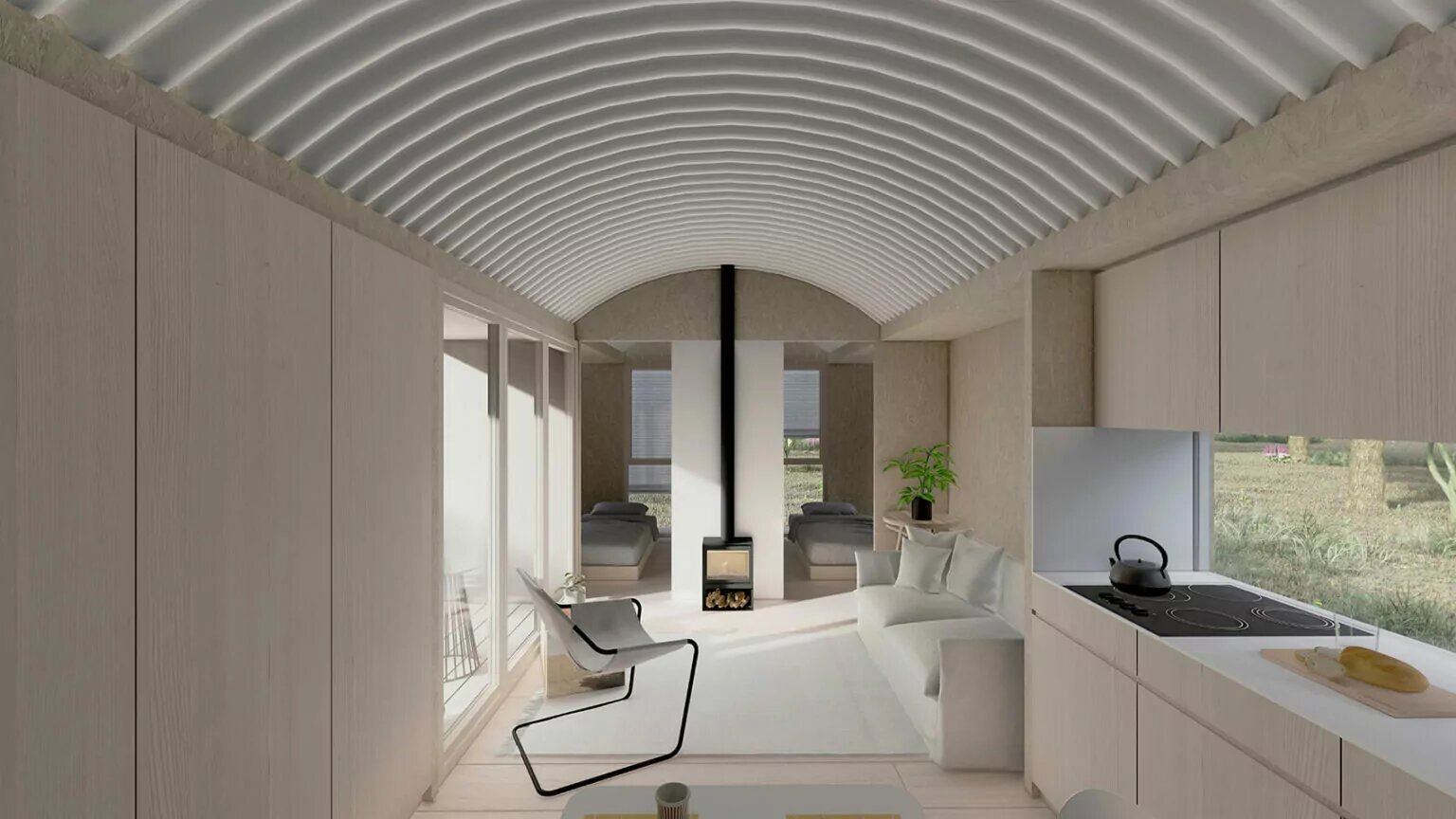 Interior de modelo de vivienda 'wahbi' en tonos claros.